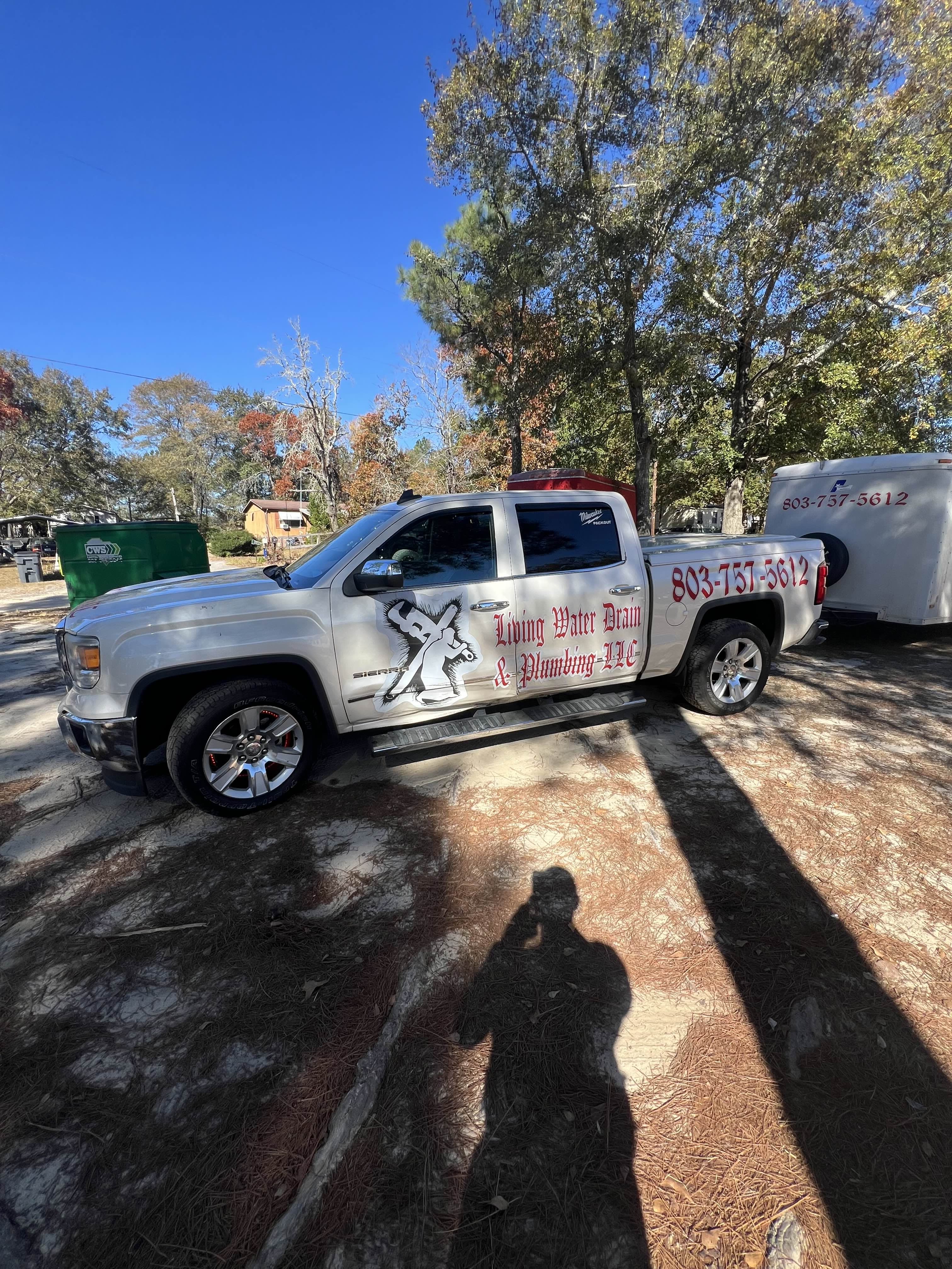 Plumber from Living Water Drain & Plumbing working on residential plumbing in Lexington SC
